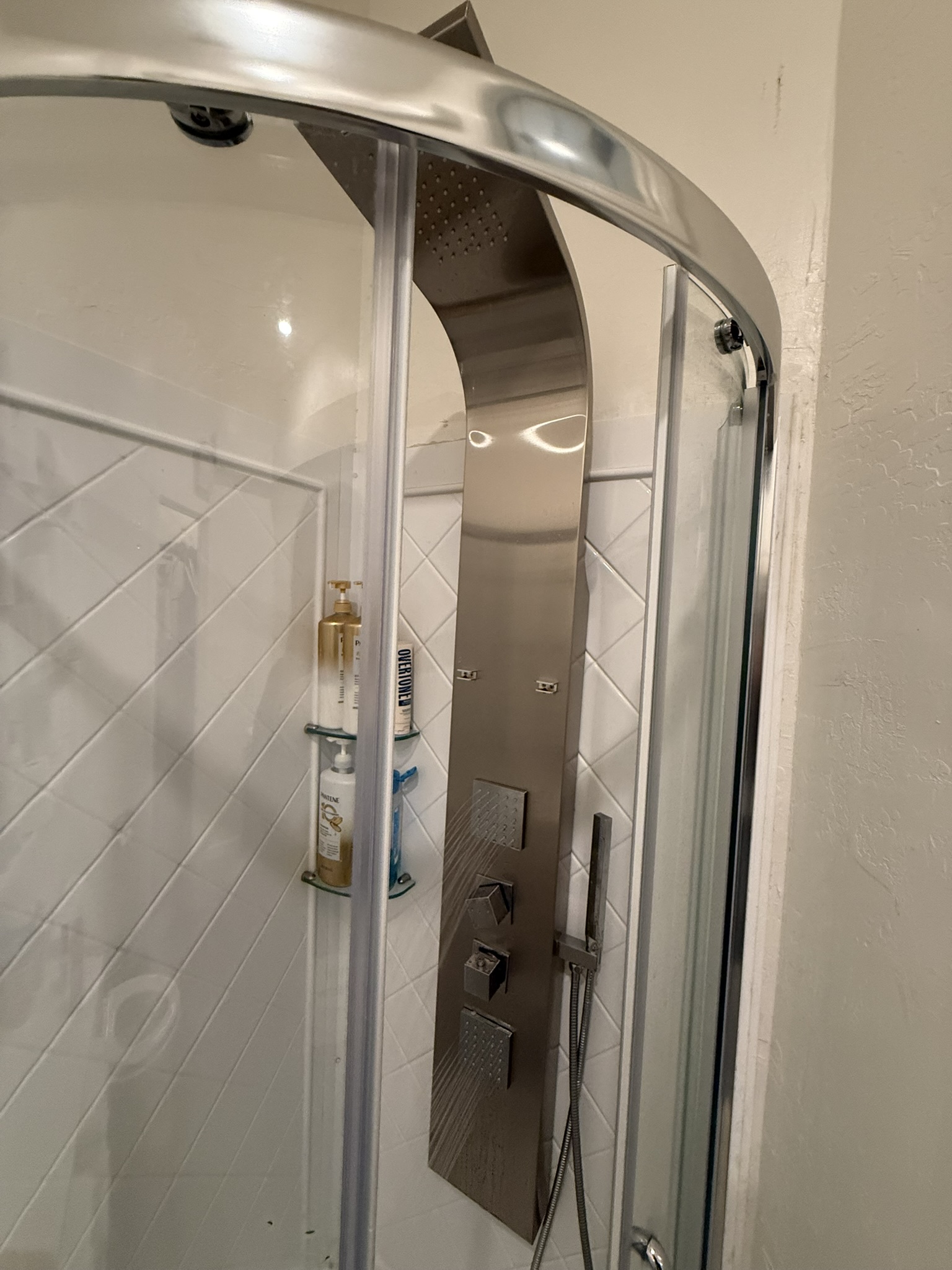 eigen space gym shower detail: it's a giant metal frame with a lot of nozzles and weird square controls